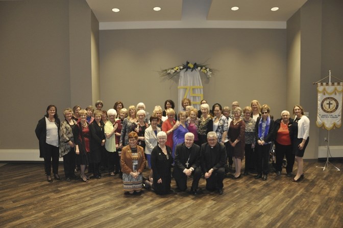The St. James Parish Catholic Women&#8217;s League members gather for their 75th anniversary celebration on Nov. 18, joined by delegates in the front row: Margaret Ann Jacons 