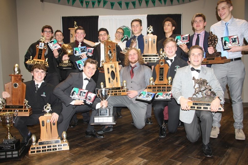 The recipients at the Holy Trinity Academy Knights football awards banquet on Nov. 30 were, front row, from left, Julian Jenkins, Ben Leggett, Evan Bruynzeel, Carson