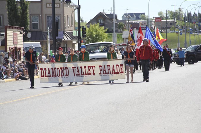 The 1st Oilfields Scouts lead the Black Diamond Parade on June 2.
