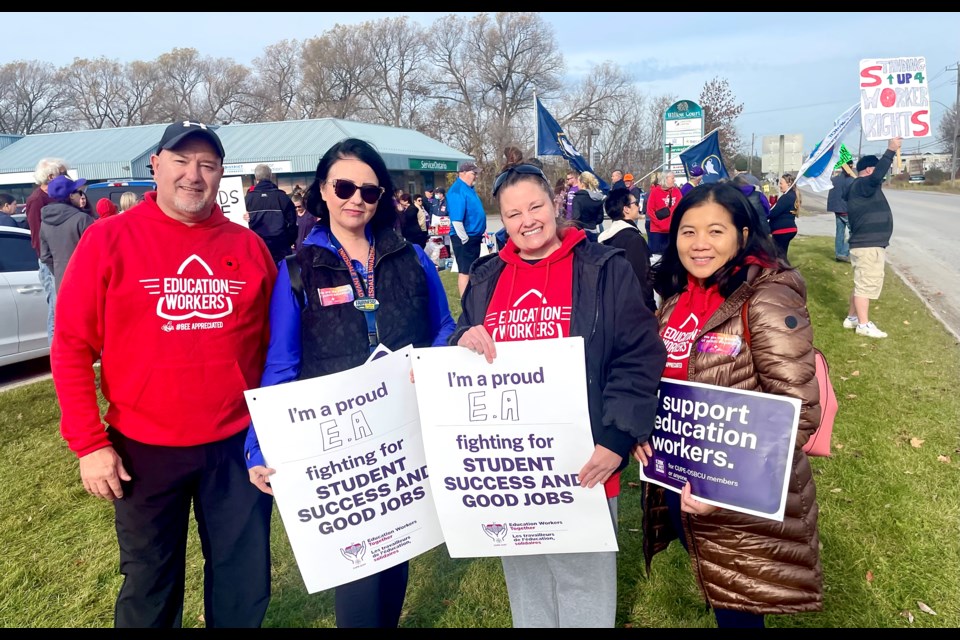 Educational assistants Rene Bernier, Carly Love, Kirsten Hartnett, and Thao Buy are among thousands across the province who went on strike Friday morning after provincial legislation imposed a contract upon them and banned them from striking.