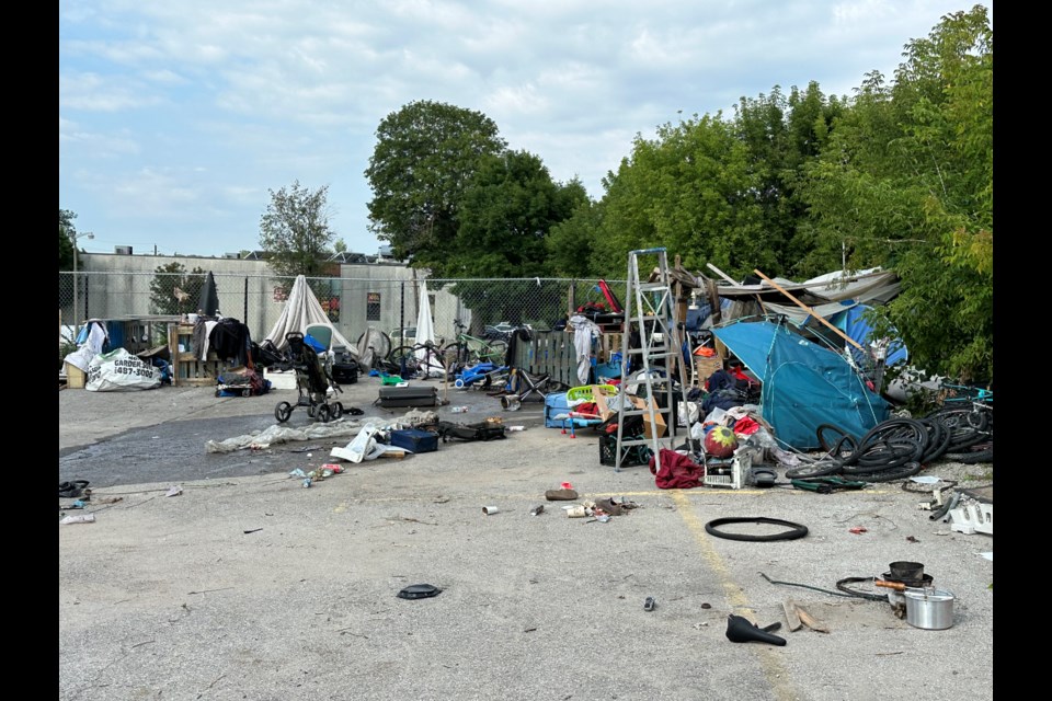 The OPP say several individuals reside in makeshift shelters at the former site of the Orillia OPP detachment on Peter Street. One individual was attempting to put out the fire as emergency services arrived. 