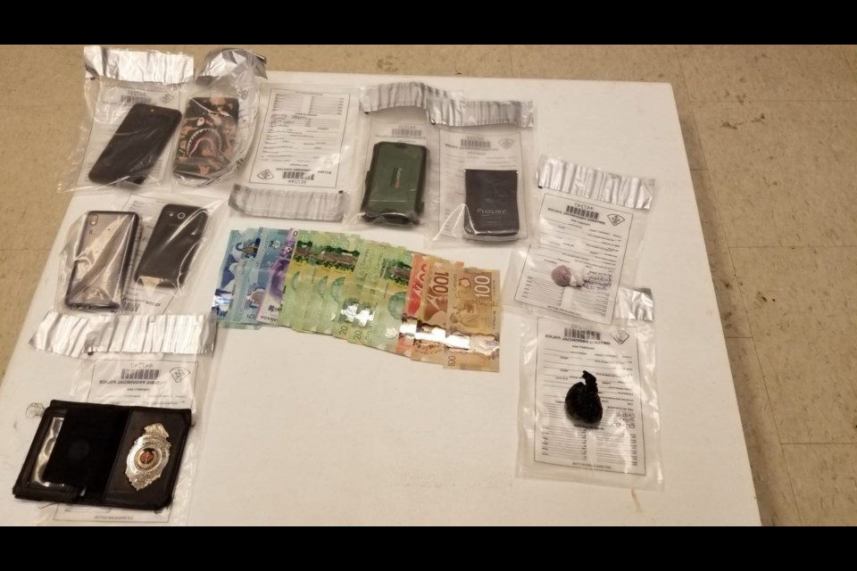 Seized currency, suspected drugs. Photo supplied by the OPP