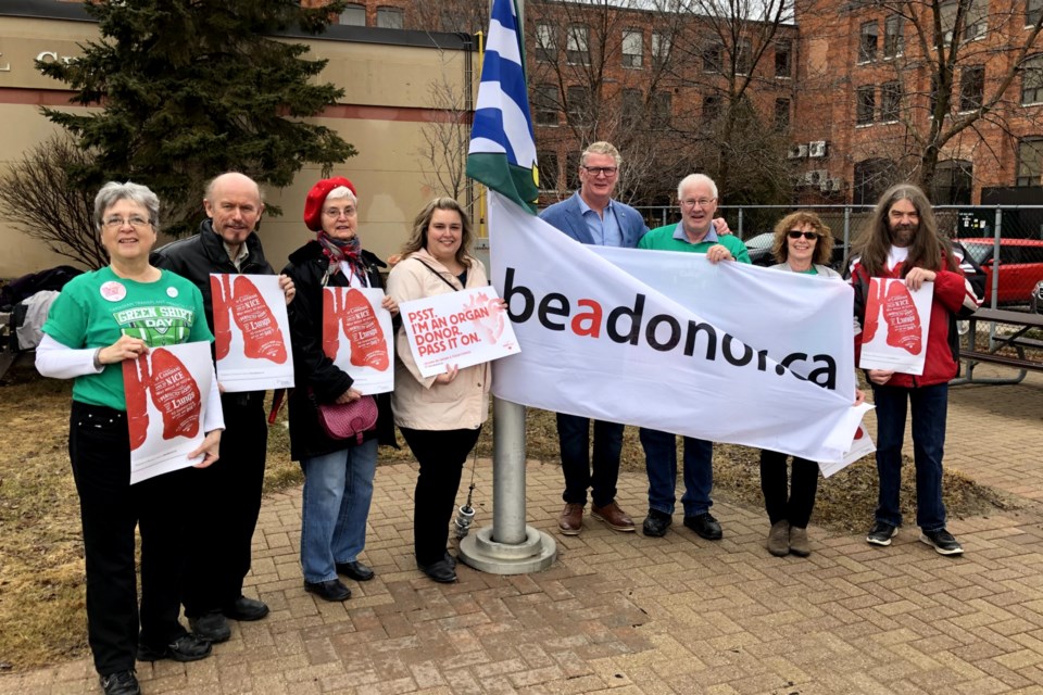 Orillia Mayor Steve Clarke helped raise the flag to mark Organ Donation Awareness Month this week at city hall. He was joined by several local advocates of organ donation and implored citizens to register their consent to donate their organs and tissue. Contributed photo