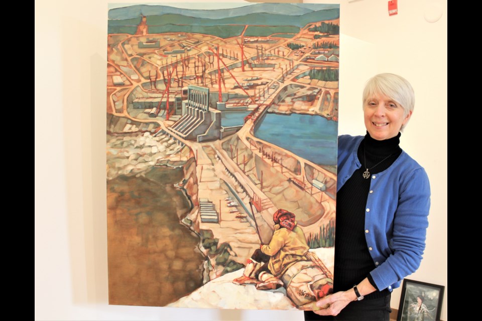 Juliana Hawke, co-ordinator of the International Women's Day Art Show, is shown with a painting by Kathryn Kaiser that will be part of the exhibit. Nathan Taylor/OrilliaMatters