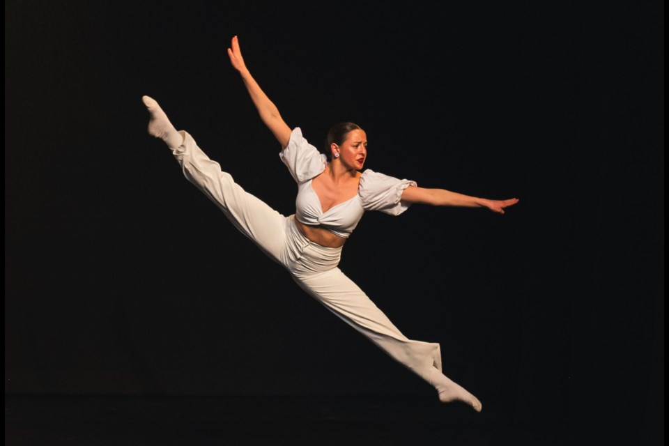 Brooke Sonnenberg, 17, with Tapps Performing Arts, is seen performing a tilt jump.