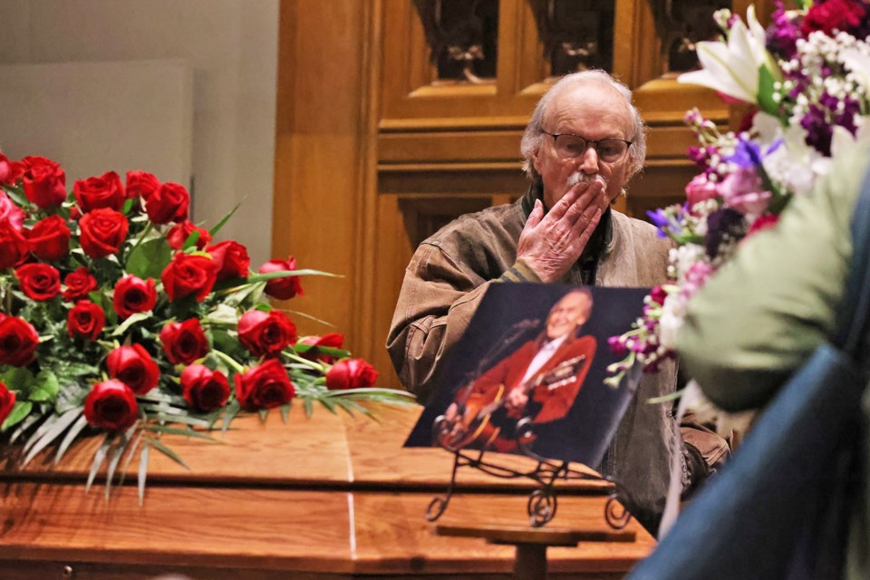People pay their respects at the public visitation for Gordon Lightfoot at St. Paul's Centre in Orillia on Sunday. Hundreds of people lined up outside for an opportunity to say goodbye to Lightfoot, who died Monday. He was 84.| Kevin Lamb for OrilliaMatters