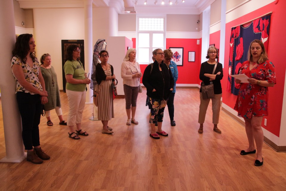 Ninette Gyorody, right, executive director, of the Orillia Museum of Art and History, offered a land acknowledgement as part of her opening words as a new exhibit, When Raven Became Spider, opened Saturday. Mehreen Shahid/OrilliaMatters