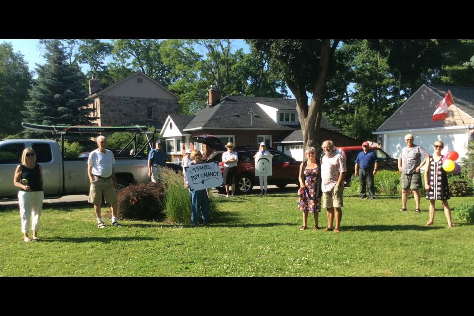 When the pandemic wiped out a planned gala to honour the retirement of Orillia Vocal Ensemble director Roy Menagh, friends and fans paid tribute to him and his wife, Nancy, with a drive-by celebration. Contributed photo