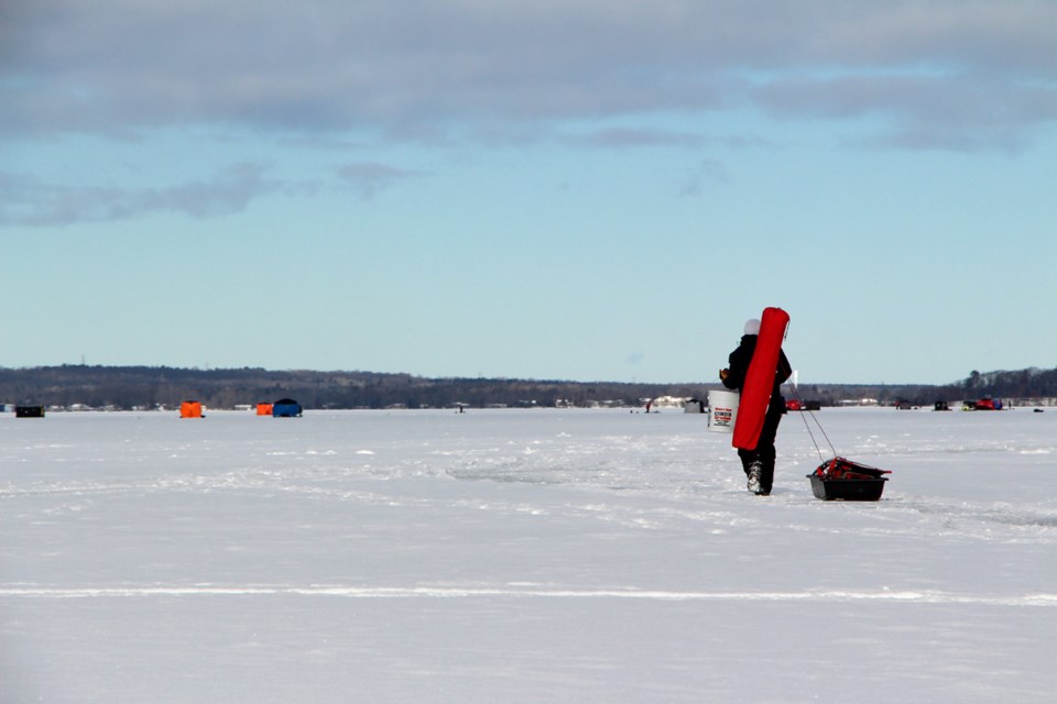Once you see the ice huts on the lake, you know that it’s winter – here’s to 2021 and more
outdoor adventures to come!