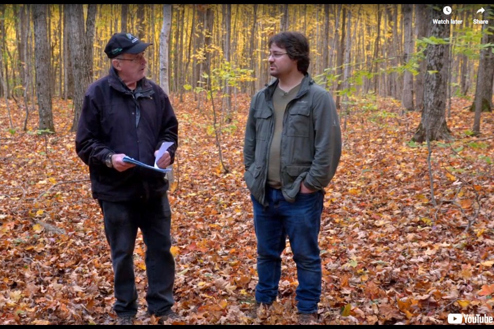 Co-instructors Bob Bowles, left, and Luke Eckstein visit local forests to produce instructional videos for a series of mushroom workshops offered as part of the Ontario Master Naturalist Program.