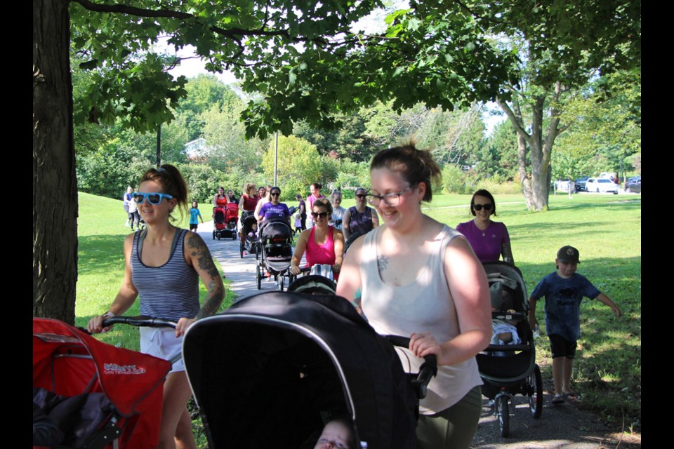 A walk around the park is a regular warm-up activity for moms in the Stroller-fit program at Homewood Park. Kathy Hunt/OrilliaMatters