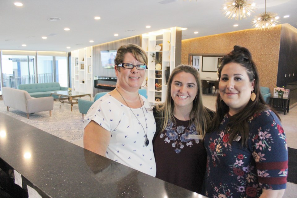 The crew at the Highwayman Inn and Conference Centre is excited about the renovations that were recently completed. From left are Kelly Callan, general manager, Erika Bramwell, guest services lead, and Bobbie-Jo Robinson, manager of 201 Grill and Game Bar. Nathan Taylor/OrilliaMatters