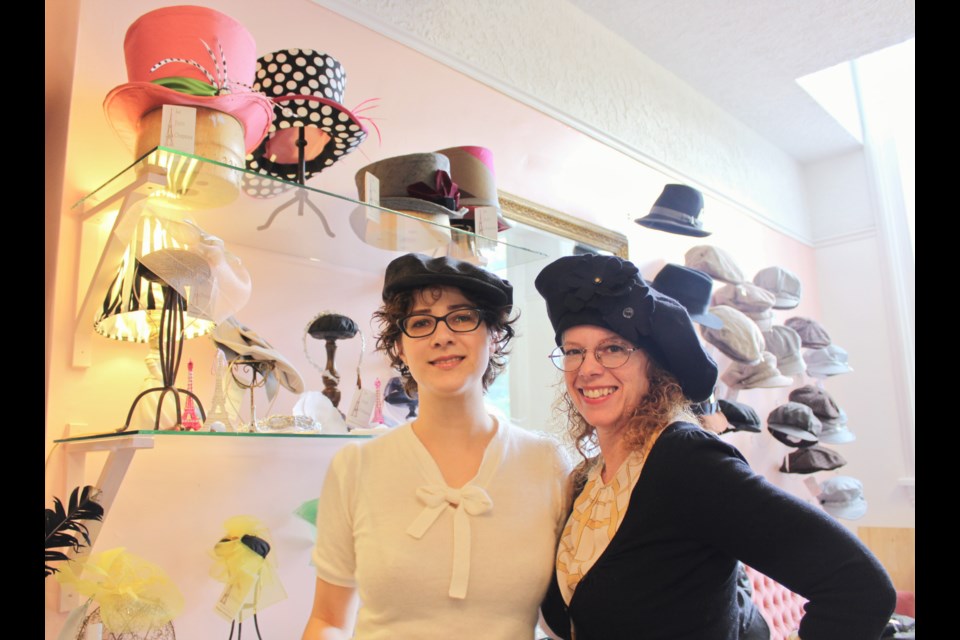 Meaghan Armstrong, right, owner of Le Petit Chapeau, is shown with milliner Sara Czech at the downtown Orillia shop. Nathan Taylor/OrilliaMatters
