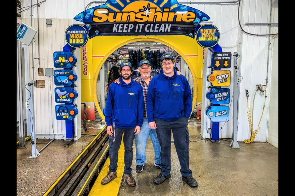 Ted Hewett, owner of Sunshine Super Wash, is shown with his sons, Cole Hewett, left, and Scott Hewett. Supplied photo