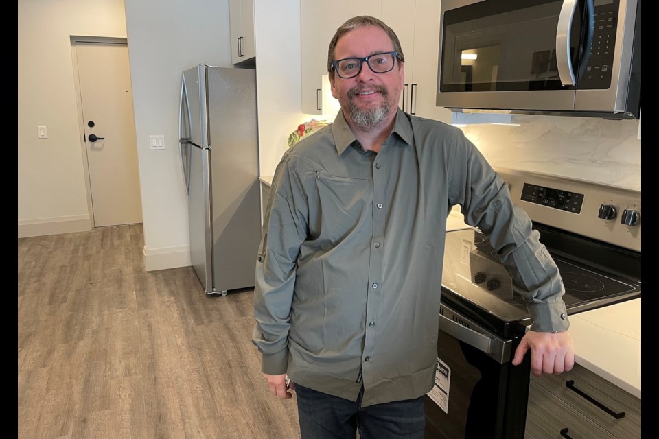 Hassey Property Group sales representative Robert Stratton hosted an open house at 75 Barrie Rd. Friday. The apartment building, the third on the site, has more than 160 units. Tenants are expected to move in Feb. 1.