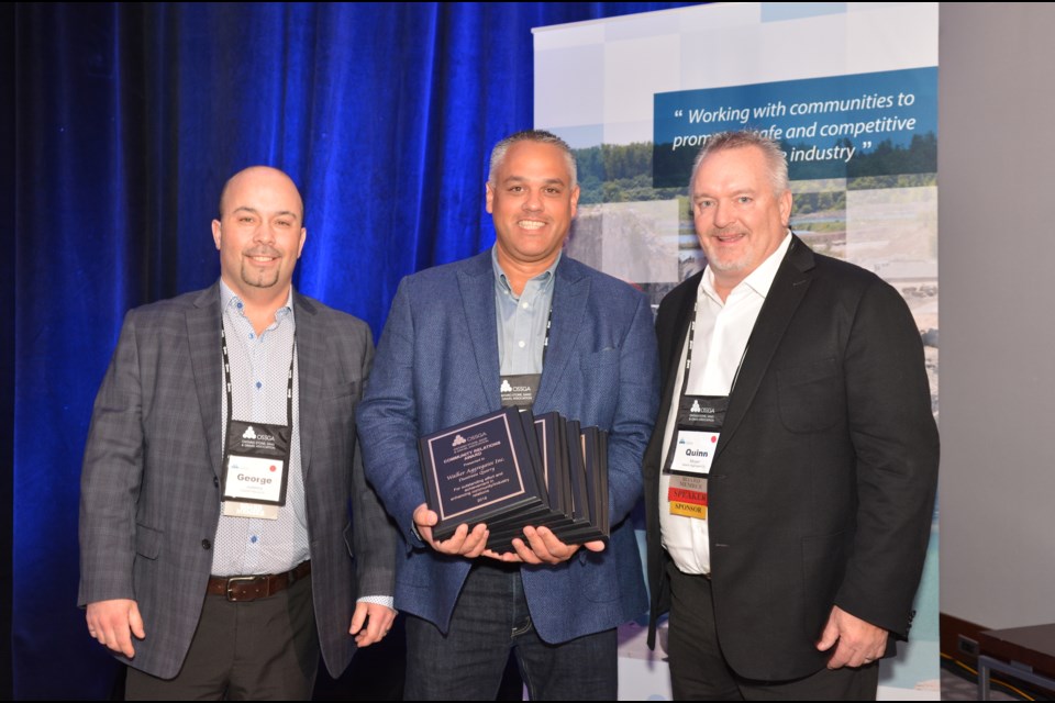 Frank Kielbowich, centre, of Walker Aggregates accepts the 2018 Community Relations and Progressive Rehabilitation Awards from the Ontario Stone, Sand & Gravel Association at their 2019 Annual Conference & AGM. Submitted photo