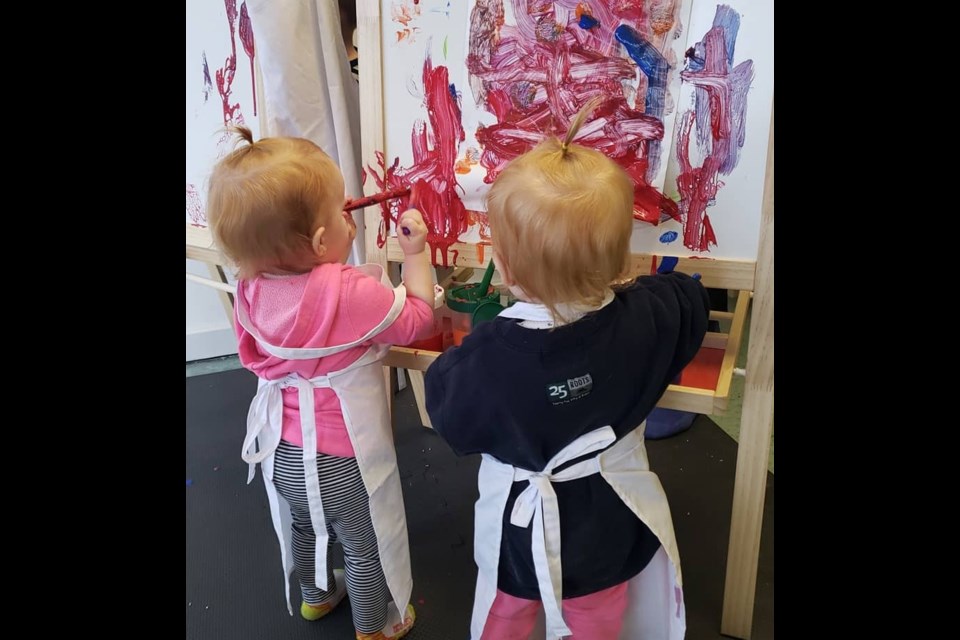 Raegan and Addison Bryant enjoy painting together at Heartworks Children's Art Studio. The new business, at 471 Laclie St., opened its doors Jan. 1. Contributed photo