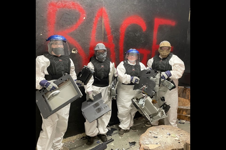 Staff from Eclectic Cafe recently enjoyed their time in the Rage Room, a popular place to let off steam at Orillia's Ax Men.