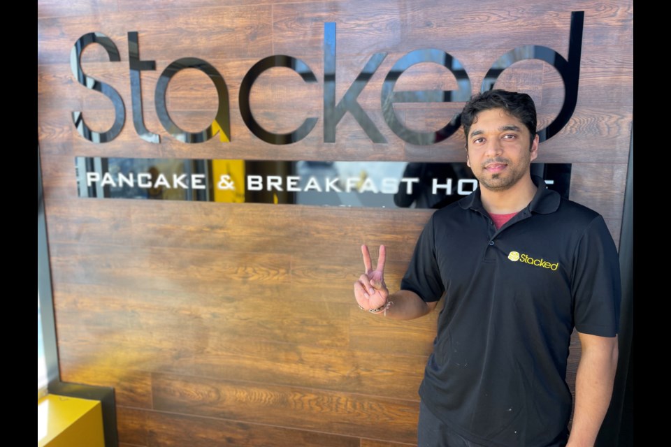 Stacked Pancake & Breakfast House owner, Nirmal “Raj” Patel, opened his new establishment for the first time on Tuesday.  