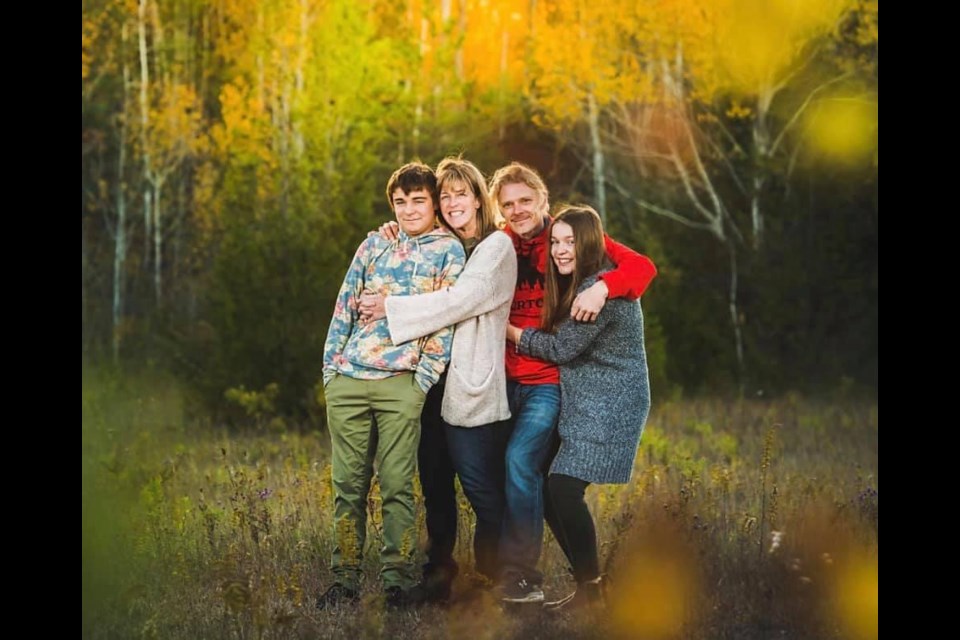 Tracey King, shown with her family, is one of two nominees for the Nelle Carter Woman of the Year Award.