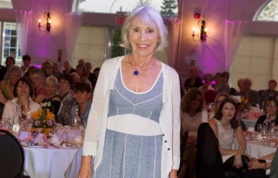 Sylvia Smith is shown modelling at the Mariposa House Hospice fundraising fashion show. Over the years, she has lent her time and talents to many local causes and organizations.