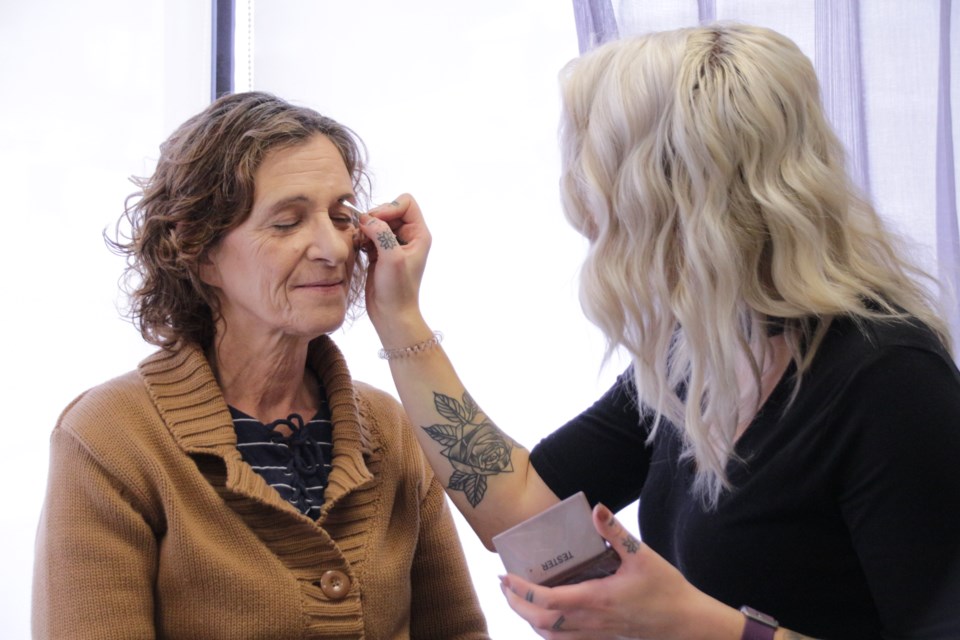 Wanda Hillier, a graduate of Dress for Success Orillia and Barrie breakfast club program, gets her free makeover from Shayna Clark, stylist at Sharp Image Salon and Spa.