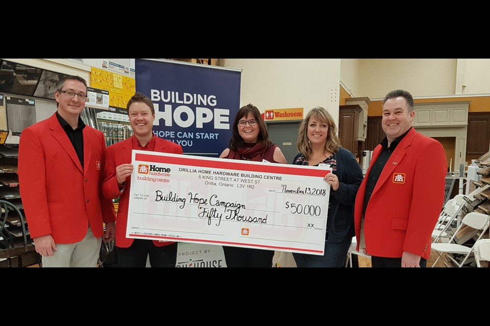 Home Hardware Orillia is known for its philanthropy; it recently donated $50,000 to the Building Hope Campaign. From left is Home Hardware co-owners Chris Locke and Kirk McLean, Lighthouse staff Linda Goodall and Lynn Thomas and Home Hardware co-owner Bill Ecklund Jr. The Orillia store was inducted into the Winner's Circle earlier this month. Contributed photo