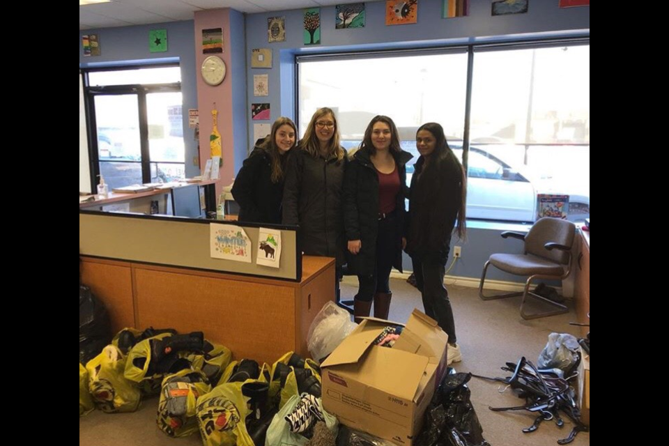 From left: Jillian Walker, Jennifer Grace, Gillian Hunnisett and Vaidehi Patel dropped off winter wear donations at the Orillia Youth Centre. Supplied photo