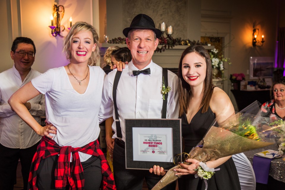 Dr. Bill Tillmann raised $3,700 and won the highest fundraising award, sponsored by Mike and Darlene England of West Street Storage. He is shown with dancing partner Elisha Litman and choreographer Jessica Lethbridge. Photo courtesy Samantha Burtt Photography 