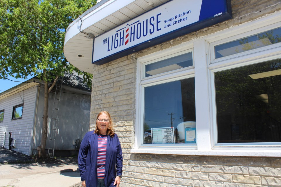 Kathy Henderson is show outside the Lighthouse, where, in May, she and her daughters took part in the Feed 14 program, providing and serving meals to visitors. Nathan Taylor/OrilliaMatters