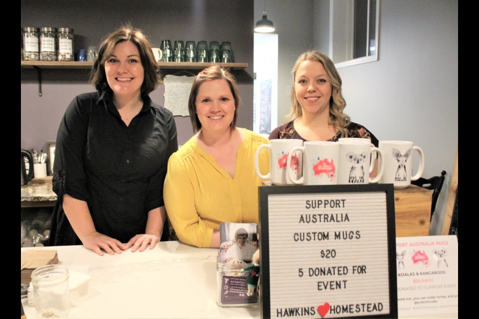 Lauren McEachern, left, owner of the Fifty Acre Garden, Melanie Robinson, centre, owner of Eclectic Café, and café manager Alana Bell are shown Saturday at Robinson's downtown Orillia business, where a fundraiser was held for Australian fire relief. Nathan Taylor/OrilliaMatters