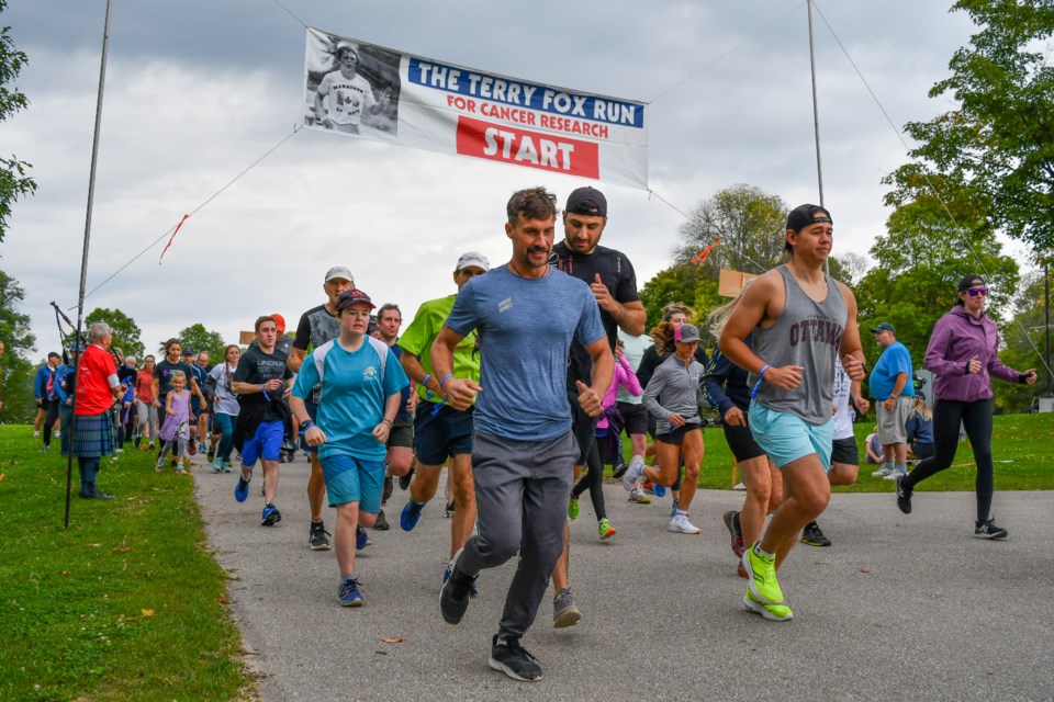 The running group heads off during the Orillia Terry Fox run Sunday.