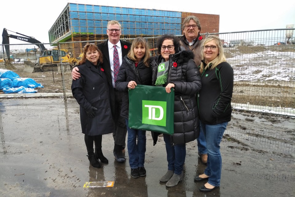 TD Canada Trust has donated $50,000 for naming rights to the outdoor walking trail at the new recreation centre. From left Orillia Recreation Centre ORC) committee member Deborah Wagner, Mayor Steve Clarke, TD Bank representatives Teresa Diogo, Brunella Southwell, Christine Hodgkinson and, in rear, ORC Committee Chair Mike Davenport. Submitted photo
