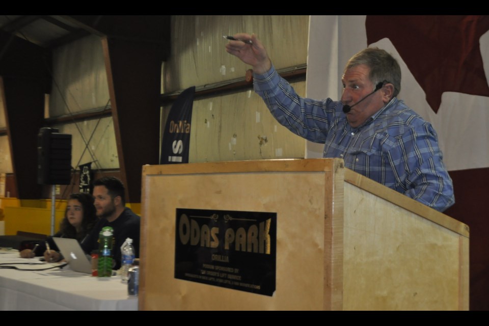Professional auctioneer David Moore takes a bid during the live auction portion of the annual Kiwanis fundraiser in 2019. This year's event will be a virtual auction for the second straight year. Andrew Philips/OrilliaMatters File Photo