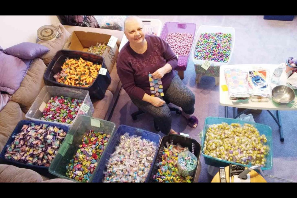 Linda Pearce has over 300 totes full of candy and toys which are organized by age, gender, and occasion. The totes help Pearce prepare gift bags for less fortunate children during various holidays throughout the year. 