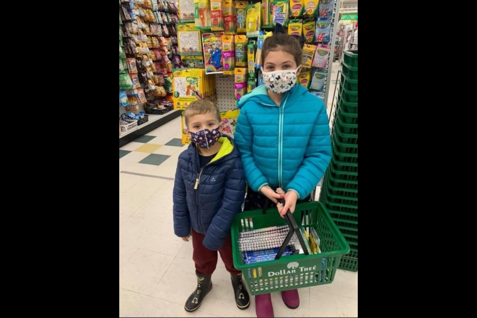 Nine-year-old Lucy Goodman and her five-year-old brother Henry recently donated hygiene products to the Orillia Youth Centre. 