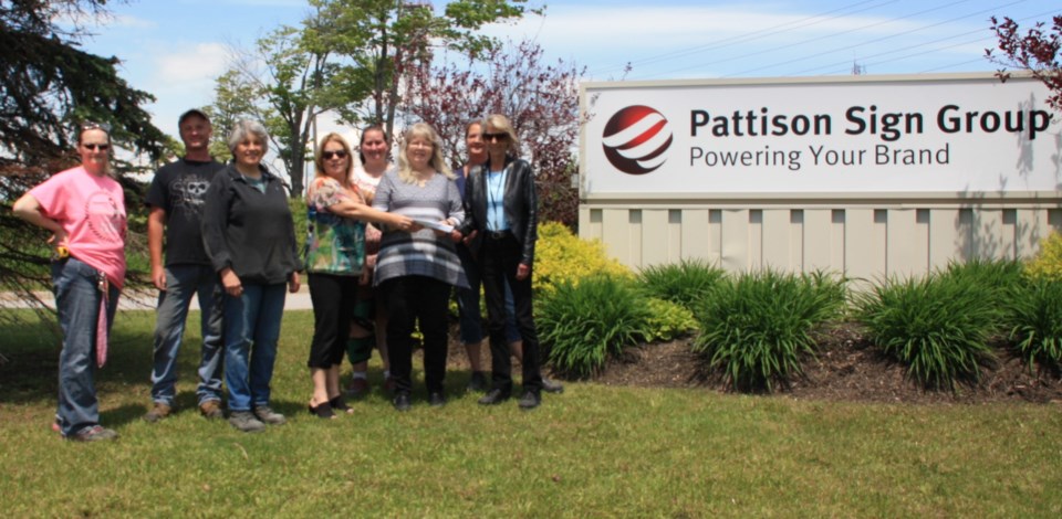 pattison sign donation to cancer society