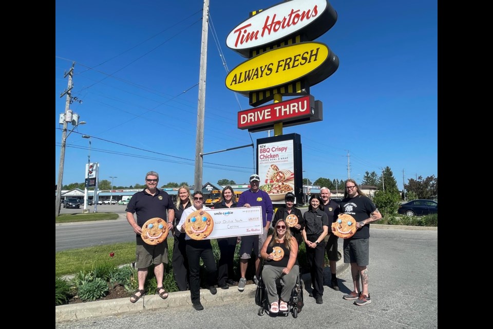 Tim Hortons employees presented members of the Orillia Youth Centre and volunteers from the Orillia Lions Club, who volunteered with the campaign, with a cheque for $86,872.57 on Tuesday morning. 