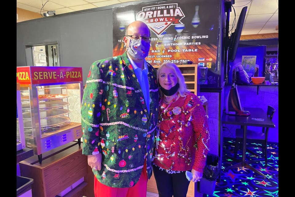 Derick Lehmann brought back the 
Ugly Sweater Bowling Party this year with the support of his mother, Marilyn. The event raised $5,500 for The Sharing Place.