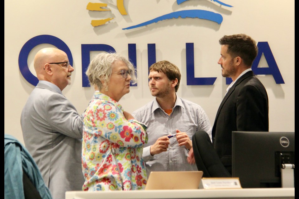 From left: Orillia city councillors David Campbell, Janet-Lynne Durnford, Jay Fallis and Luke Leatherdale discuss the new budget process during a special meeting at city hall earlier this week.