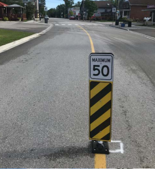 Coun. Jay Fallis was hoping council would agree to erect centre-line signs like this to help slow traffic on some city streets. The proposal has been postponed until the fall. Contributed photo