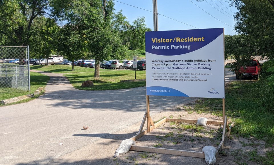 resident parking sign at tudhope visitor lot