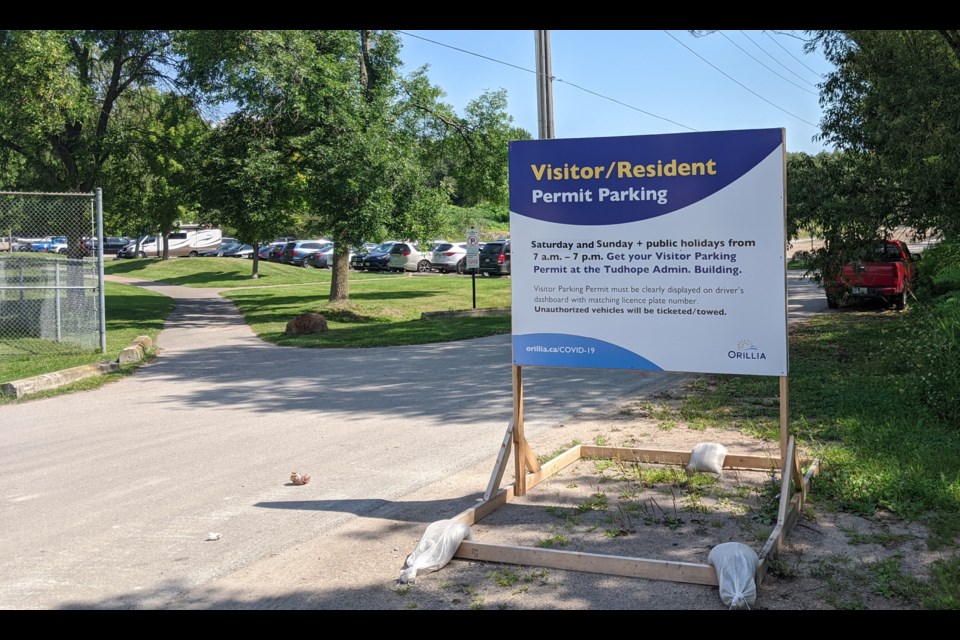 Multiple signs were erected near local beach parking lots last summer to let people know about the new restrictions put in place from Thursday through Sundays until mid-September. The goal was to dissuade visitors from coming to the area during the pandemic. Council is considering a similar initiative this summer - but with some new wrinkles. Dave Dawson/OrilliaMatters File Photo