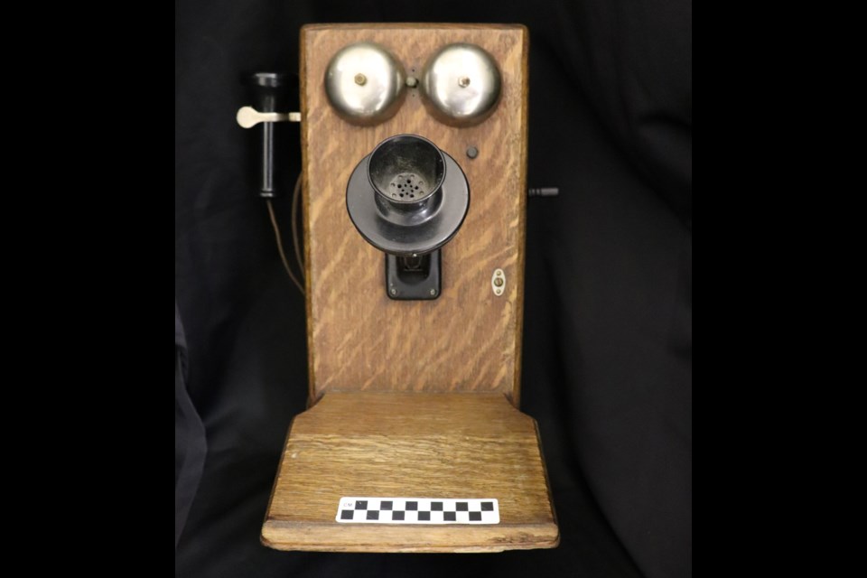This image shows the wall phone closed, as it would have appeared suspended on the wall of a home.