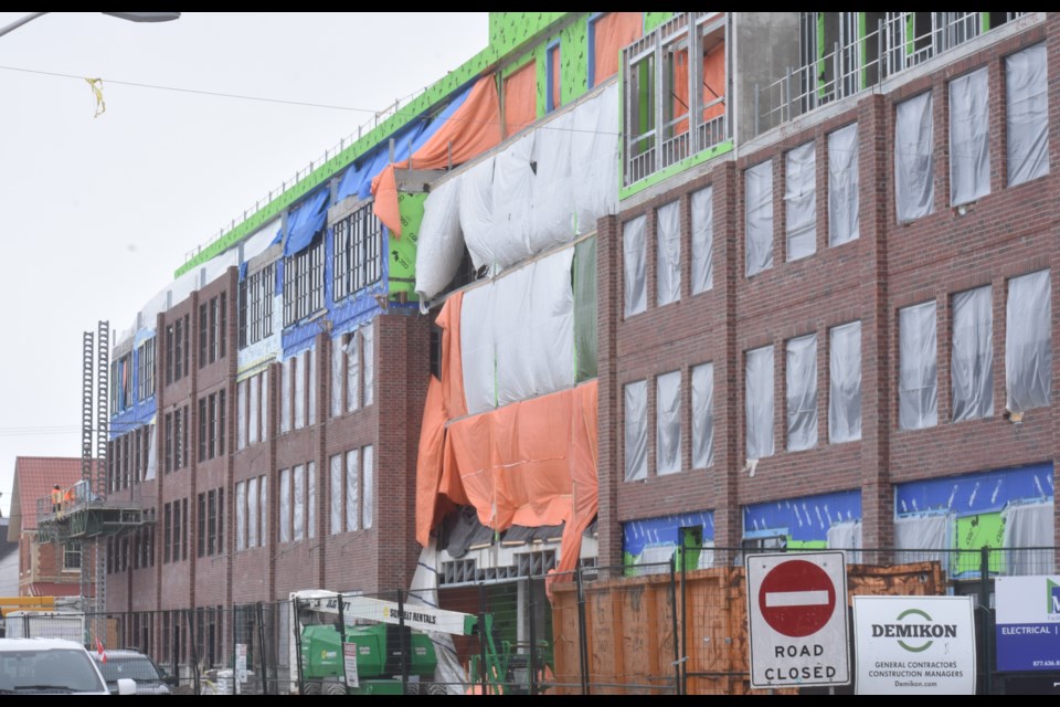 Work continues at the Matchedash Lofts condominium project in downtown Orillia. The hope is to have people living in the new building by late summer. Dave Dawson/OrilliaMatters