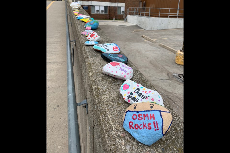 Some thoughtful and creative people have added to the ever-growing row of rocks, painted with messages of support for workers inside Soldiers’. They are placed on the ramp leading up to the main entrance of the hospital. Contributed photo