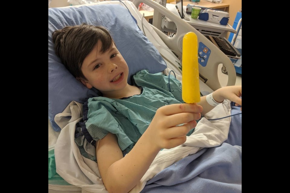 Carson Szreier had to spend the weekend at OSMH to have his appendix removed. A banana-flavoured popsicle was a nice treat for the youngster. Contributed photo