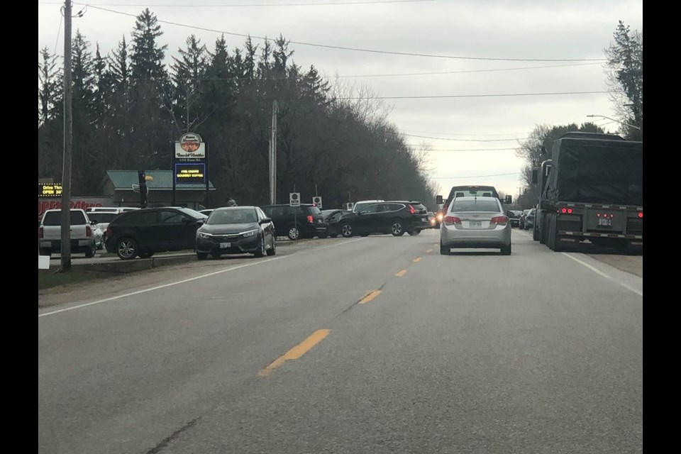 Traffic was lined up outside smoke shops in Rama First Nation on April 8 when it was announced the shops would close until at least April 15. The closure has now been extended to May 13. Contributed photo