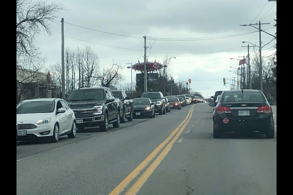 Traffic was lined up outside smoke shops in Rama First Nation today when it was announced the shops will close today at 6 p.m. - until at least April 15. Contributed photo