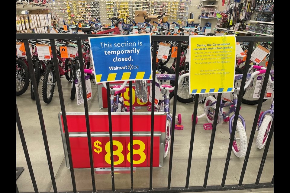 The sports section at Walmart was gated and tapped off on Thursday, the first day of the provincewide stay-at-home order. 
